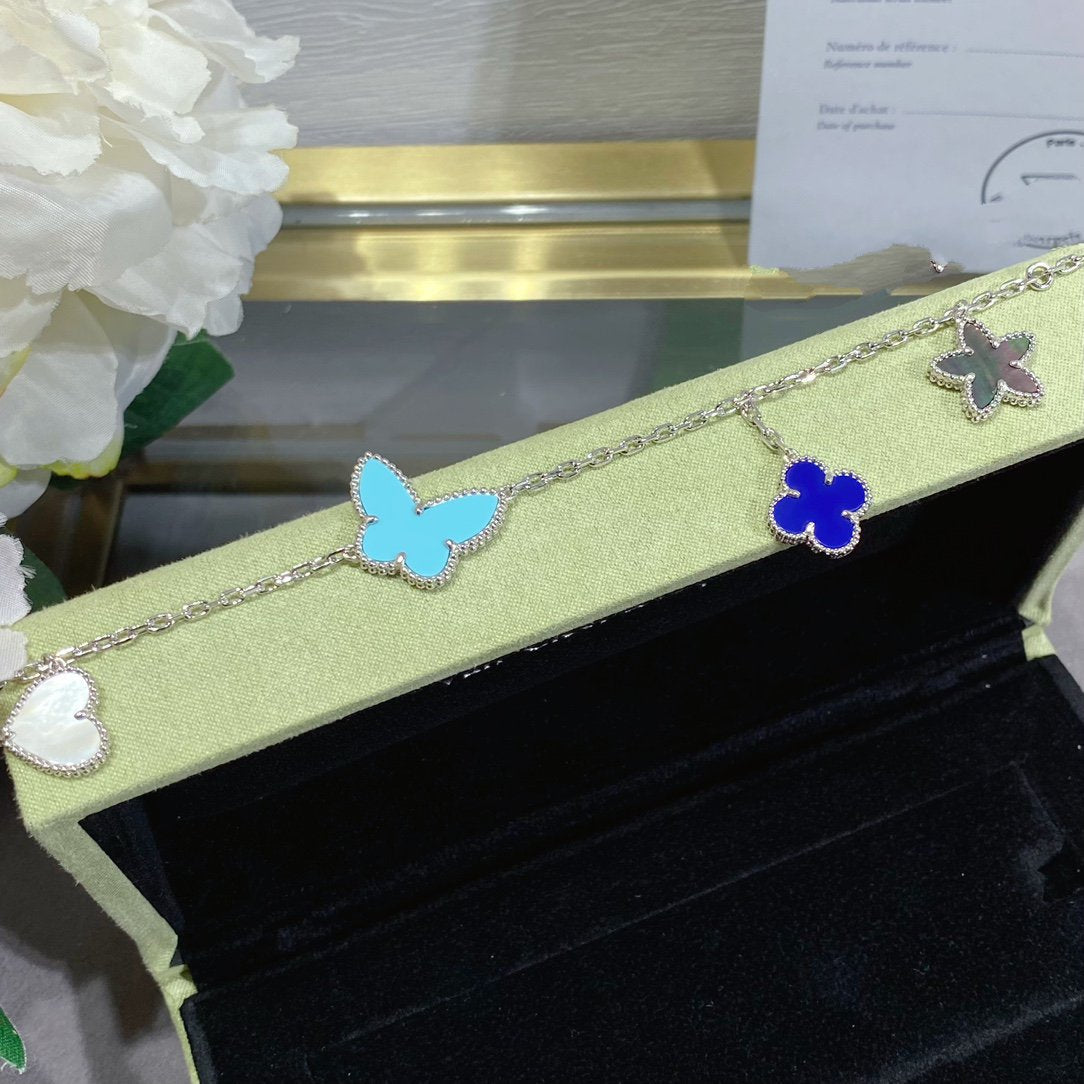 [BLAUE TRÄNEN] GLÜCKLICHES FRÜHLINGS-SILBERARMBAND MIT 4 MOTIV