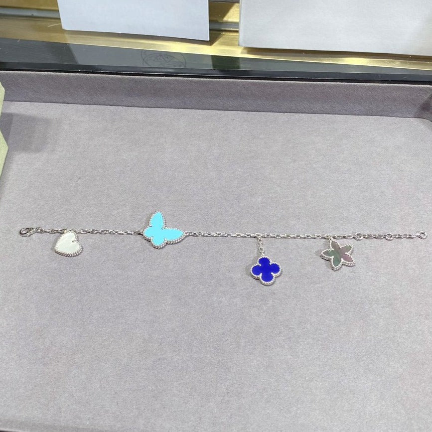 [BLAUE TRÄNEN] GLÜCKLICHES FRÜHLINGS-SILBERARMBAND MIT 4 MOTIV