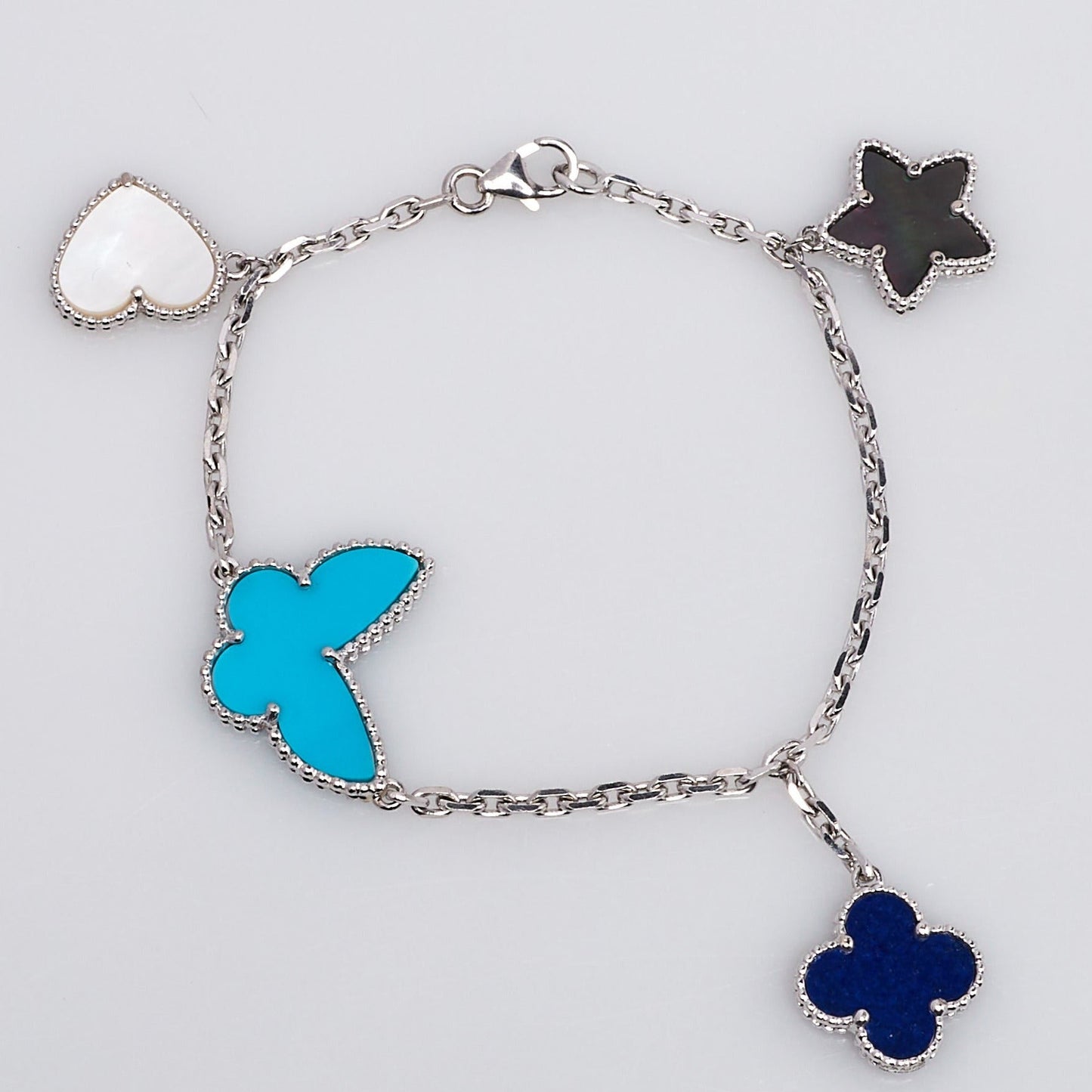 [BLAUE TRÄNEN] GLÜCKLICHES FRÜHLINGS-SILBERARMBAND MIT 4 MOTIV